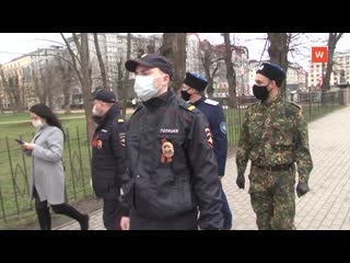 the streets of vyborg are regularly patrolled by police, people's guards and administration staff