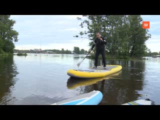 sports interest: surfing plus paddle equals sup